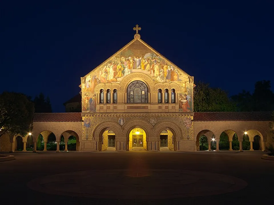 Ornate church facade with arches and mosaic artwork