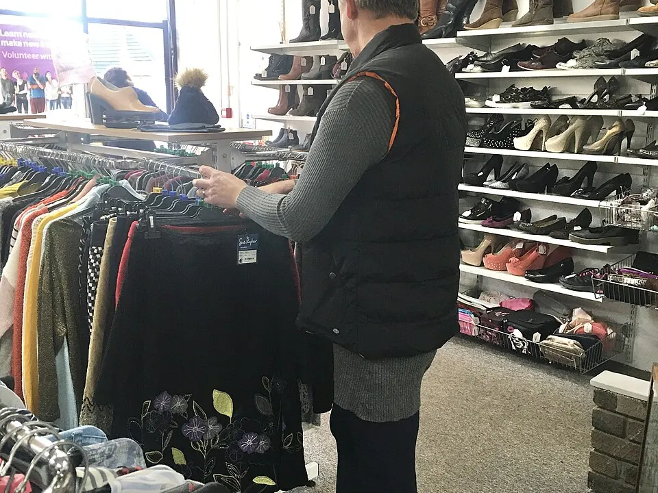 Volunteers helping at a charity shop