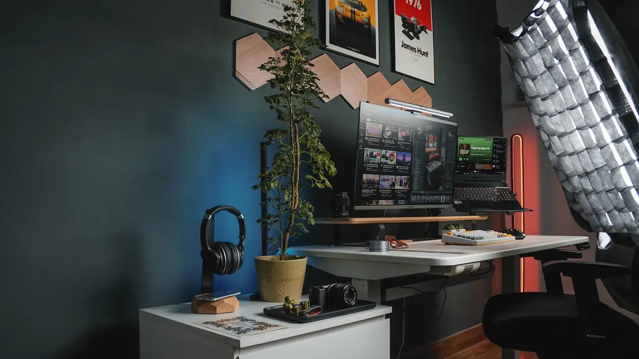 A workspace with a keyboard and notebook