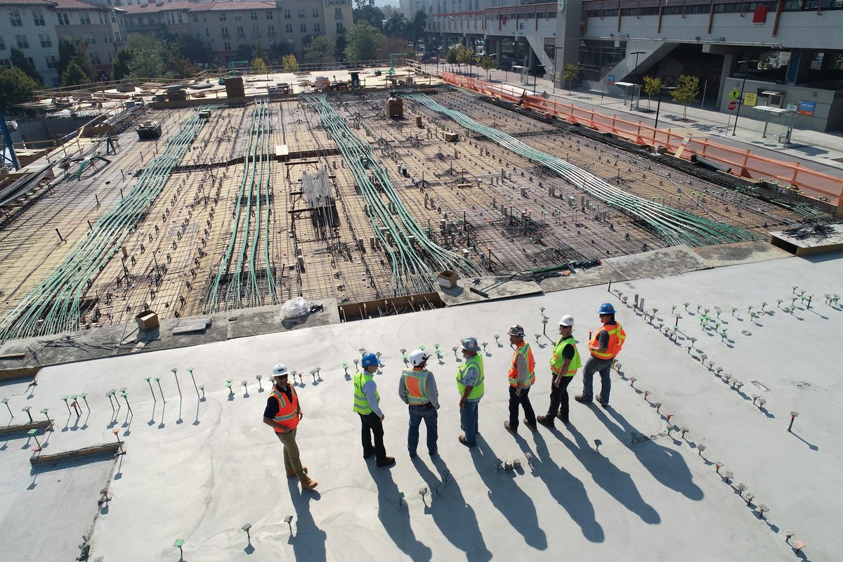 Construction crew on a concrete slab at a U.S. construction site
